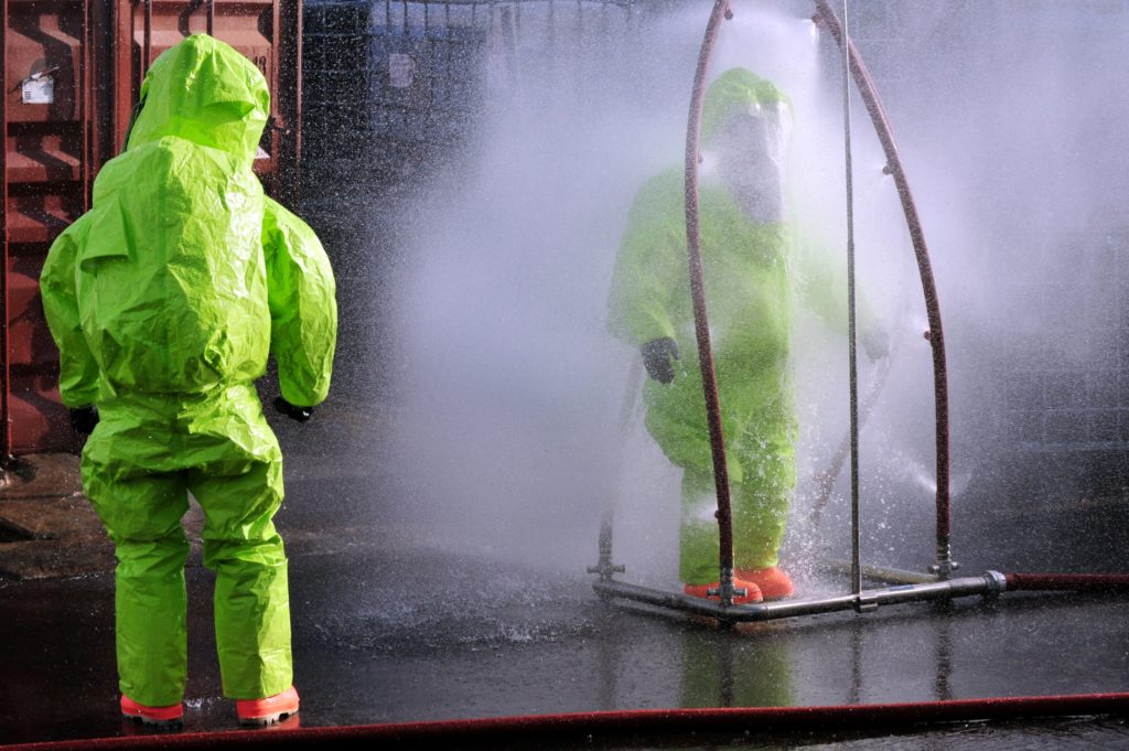 Worker decontaminate himself. 