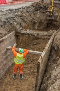 worker inside a trench