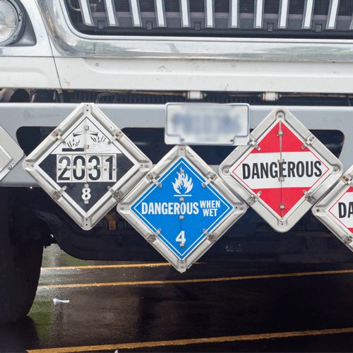 DOT Hazmat Function Specific Training: Placarding Three types of placards on the front of a truck