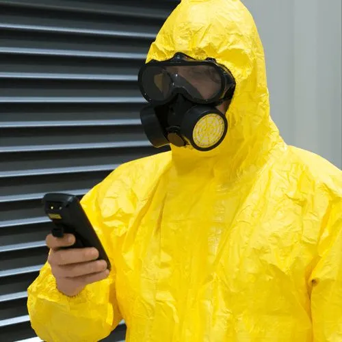 OSHA 24 Hour HAZWOPER Training man in hazmat suit with a tester