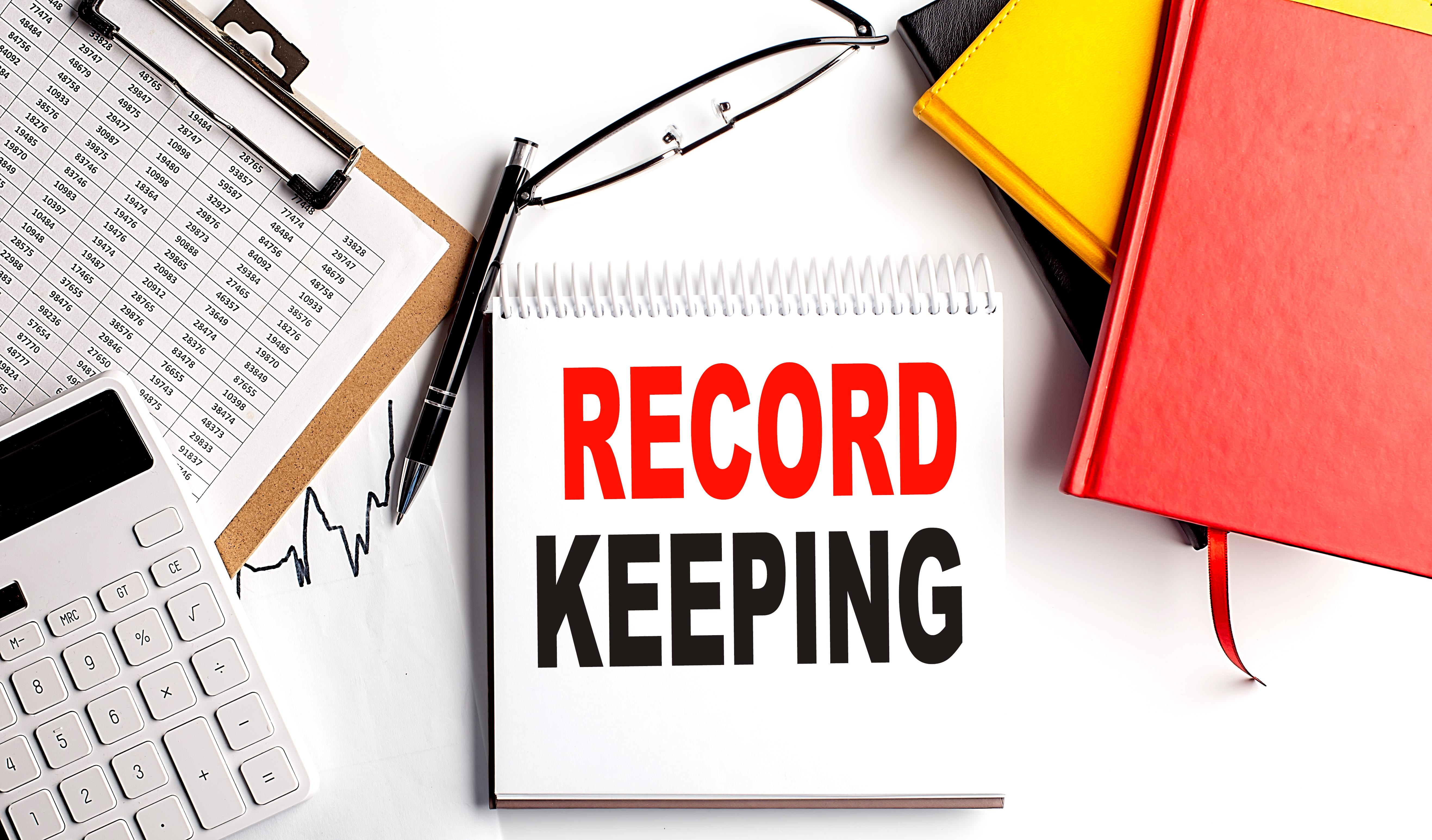 Illustration of recordkeeping with files and other documents