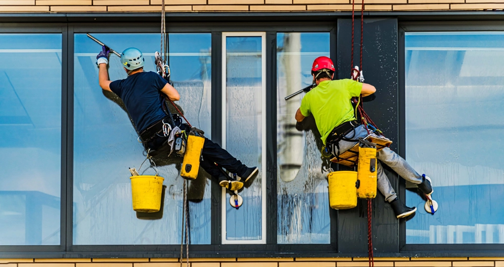 Window Cleaners working at heights - fall protection training required