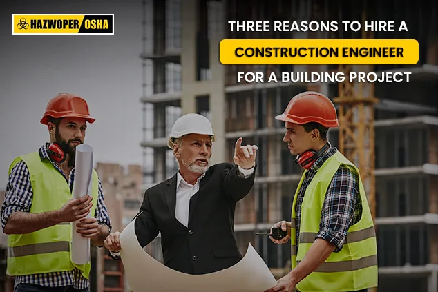 Construction engineer with workers at a construction site